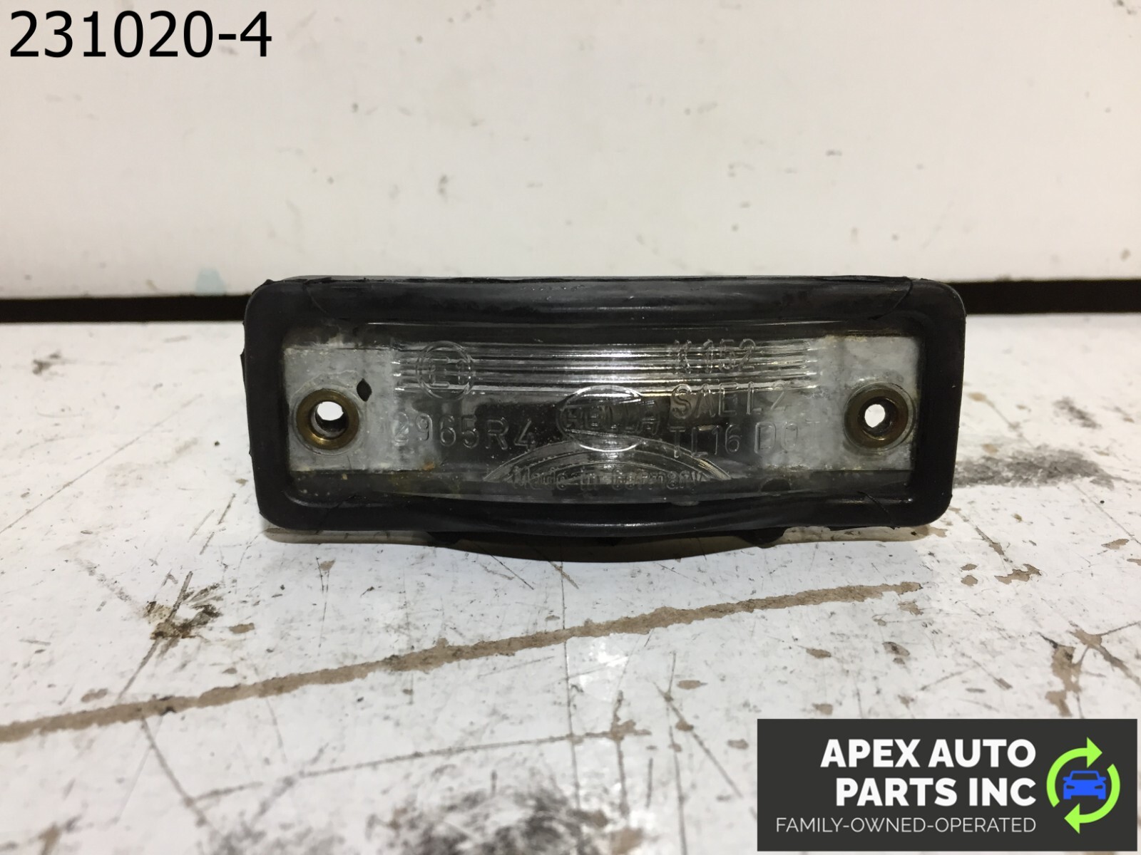 OEM 1990 Cadillac Allante Liscense Plate Light