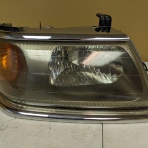 2000-2004 MITSUBISHI MONTERO SPORT Passenger Right (Headlight) Lamp Chrome OEM